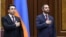 Armenia - Speaker Alen Simonian (left) and his deputy Ruben Rubinian open a session of the National Assembly.
