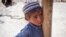 Khalid, 8, fled with his family from their home in Samangan Province. 