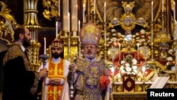 Turkey -- Archbishop Aram Ateshian, General Vicar of the Armenian Patriarch in Turkey, (C) holds a mass at Surp Asdvadzadzin Patriarchal Church in Istanbul, April 24, 2015