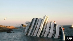 Italy -- Costa Concordia after the cruise ship with more than 4,000 people on board ran aground and keeled over off the Isola del Giglio, 14Jan2012