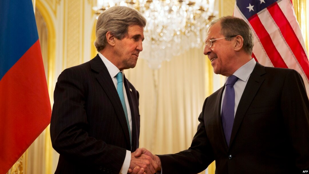 U.S. Secretary of State John Kerry (left) shakes hands with Russian Foreign Minister Sergei Lavrov (right) at a meeting last year.