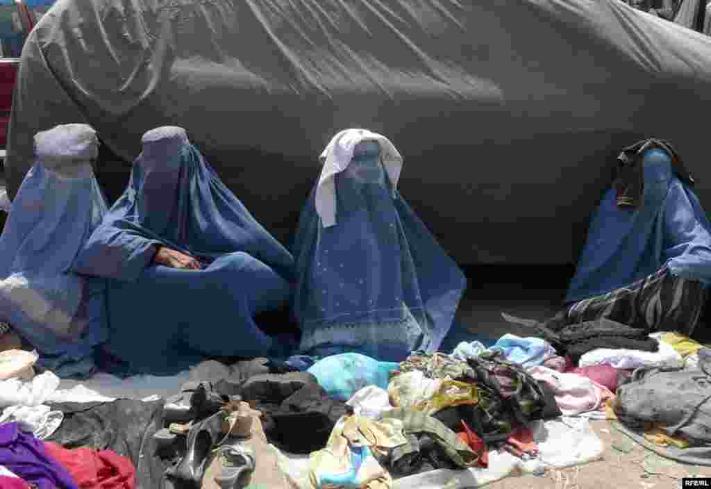 Afghanistan -- Afghan women sales cloths on a road side in Kabul Afghanistan October 4, 2009 - Afghanistan -- Afghan women sales cloths on a road side in Kabul Afghanistan October 4, 2009