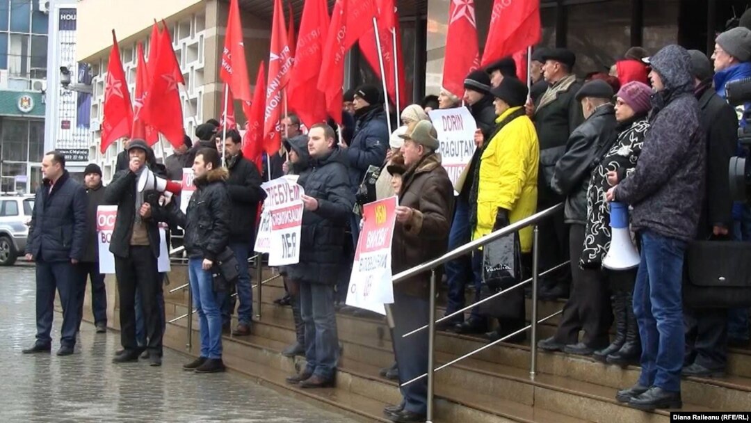 Moldovan Socialists protest the devaluation of the currency, the lei, in front of the National Bank in Chisinau recently.