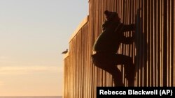 Migrant nga Hondurasi, fotografi ilustruese.