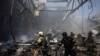 Հրշեջներն մարում են ռուսական հրթիռային հարվածների հետևանքով տպագրատան տարածքում բռնկված հրդեհը, 23-ը մայիսի, 2024թ.