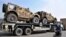 Vehicule militare NATO transportate în Afghanistan