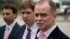 Ivan Pavlov (right) speaks to journalists in Moscow on April 29.