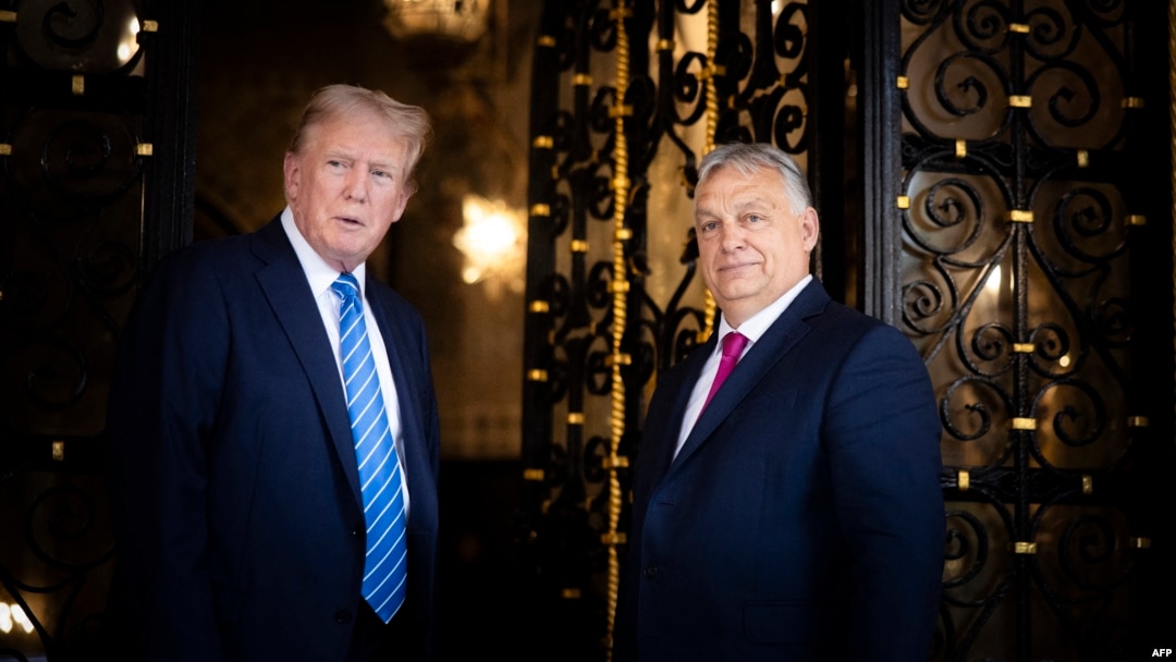Hungarian Prime Minister Viktor Orban (right) and U.S. President-elect Donald Trump at Trump's estate in Mar-a-Lago in Palm Beach, Florida, in July.