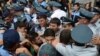 Armenia - Youth activists clash with riot police during a demonstration against eletricity price increases, Yerevan, 17Jun2015.