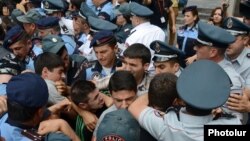 Armenia - Youth activists clash with riot police during a demonstration against eletricity price increases, Yerevan, 17Jun2015.