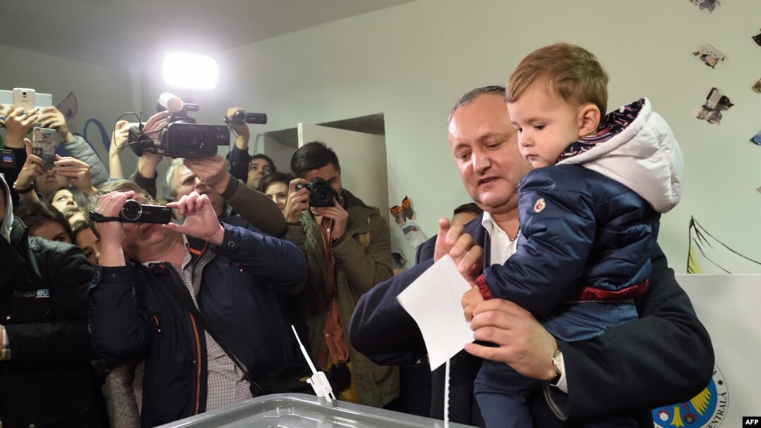The presidential candidate of the Socialist Party of Moldova, Igor Dodon, votes at a polling station in Chisinau on October 30.