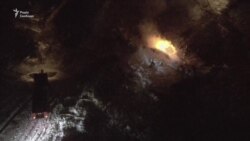 Рятувальники гасять пожежу на місці аварії вертольота у Кременчуці