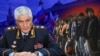 Коллаж: Колокольцев, мигранты