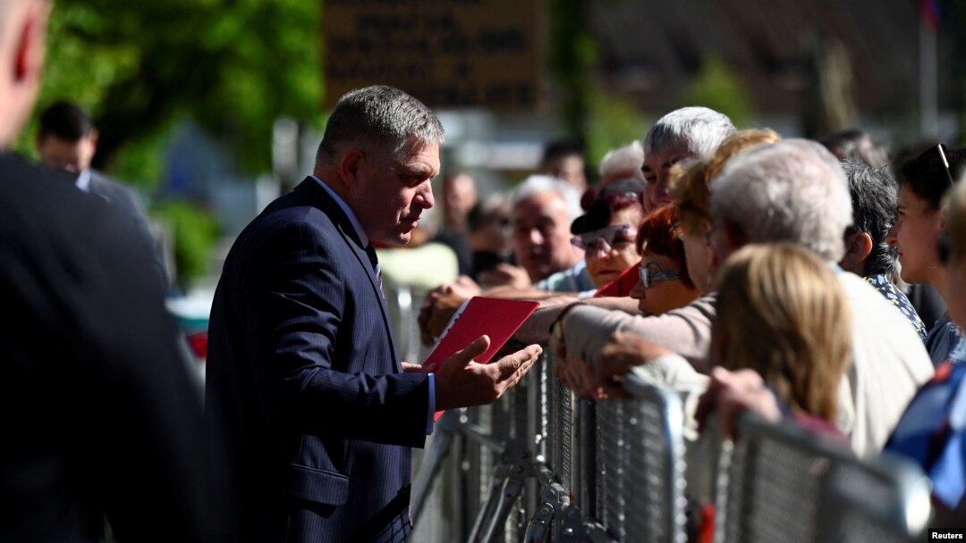 Slovak PM Robert Fico greets people in Handlova, Slovakia where he was shot on May 15.