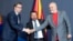 Serbian President Aleksandar Vucic (left), North Macedonia's prime minister, Zoran Zaev (center), and Albanian Prime Minister Edi Rama pose for photographers after signing documents during the Skopje Economic Forum on Regional Cooperation on July 29. 