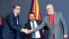 NORTH MACEDONIA -- Serbian President Aleksandar Vucic (L), North Macedonian Prime Minister Zoran Zaev (C) and Albanian Prime Minister Edi Rama shake hands after signing documents during the Skopje Economic Forum on Regional Cooperation in Skopje, July 29,