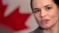 Belarusian opposition figure Svyatlana Tsikhanouskaya speaks to the members of press following a meeting with Canada's foreign minister in Vilnius on October 16.