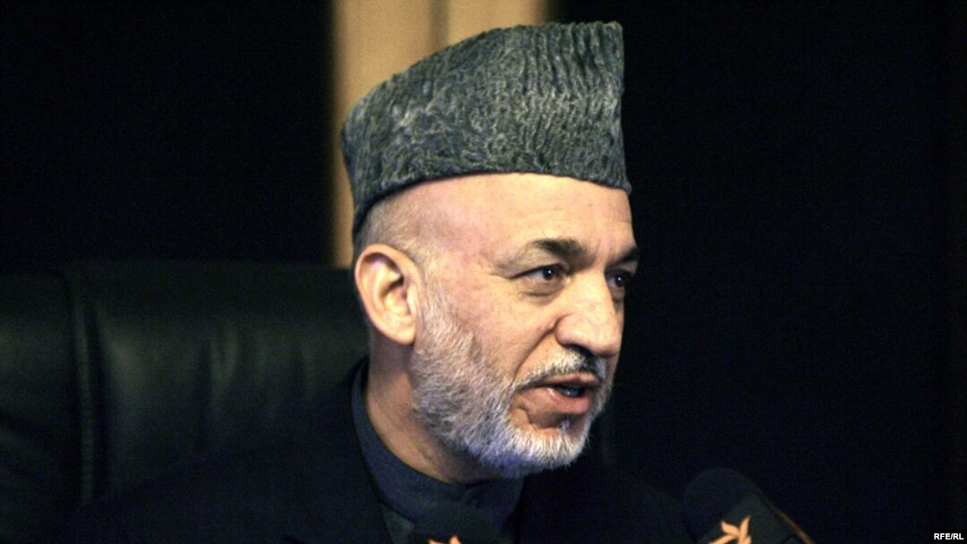 Afghan President Hamid Karzai speaks during an interview with RFE/RL in Kabul on November 1.