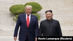 Donald Tramp i Kim Džong Un