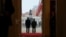 Polish President Karol Nawrocki (left) and Ukrainian President Volodymyr Zelenskyy seen from behind during a welcoming ceremony at the Presidential Palace in Warsaw in December 2025. 
