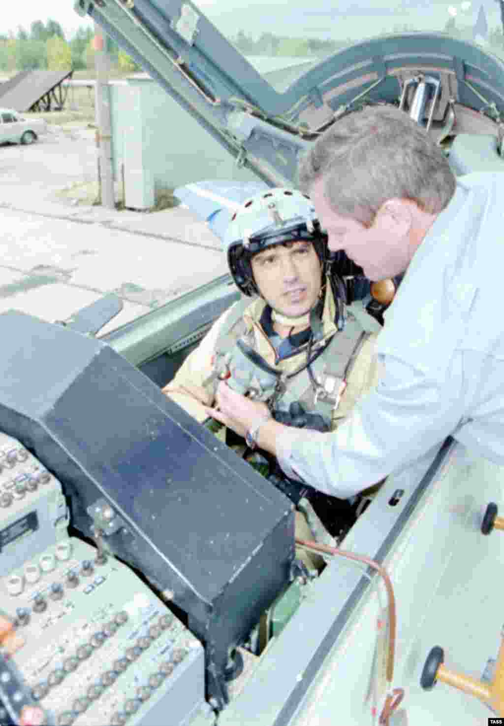 Nemtsov prepares for a flight in a MiG-29 fighter jet produced in&nbsp;Nizhny Novgorod in 1996.