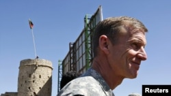 General Stanley McChrystal joined Hamid Karzai on the visit to reassure tribal leaders in Kandahar.