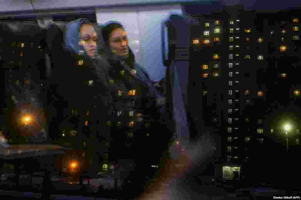 Two women travel by train on the outskirts of Moscow. (AFP/Dimitar Dilkoff)