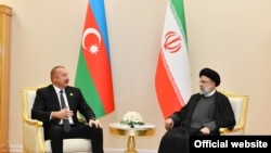 Azərbaycan Prezidenti İlham Əliyev və İran Prezidenti Seyid Ibrahim Rəisi, Aşqabad, 28 noyabr 2021 