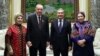 Ogulgerek Berdymukhammedova is seen at far right in this photo that appeared in Turkish media, along her husband, Turkmen President Gurbanguly Berdymukhammedov (second from right), Turkish leader Recep Tayyip Erdogan (second from left), and his wife, Emine Erdogan.