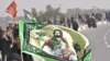 Shi'ite Pilgrims Crowd Iraqi Shrine Despite Attacks