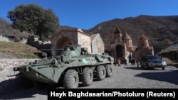 An armored personnel carrier of the Russian peacekeeping forces is seen near Dadivank Monastery, November 24, 2020.