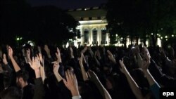 Protesters vote to stay in place during an "Occupy-style" protest in Moscow on May 15.