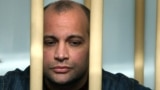 The pardon for Sergei Khadzhikurbanov, convicted of involvement in Anna Politkovskaya's killing, was "a monstrous instance of injustice and lawlessness," the late journalist's children and the staff of Novaya gazeta said. (file photo)
