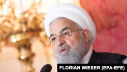 Iranian President Hassan Rouhani speaks during a press statement after his meeting with Austrian Federal President Alexander Van der Bellen (not pictured) in Vienna, Austria, 04 July 2018