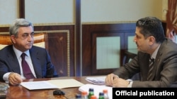 Armenia - President Serzh Sarkisian (L) and Prime Minister Tigran Sarkisian at a government meeting in Yerevan.