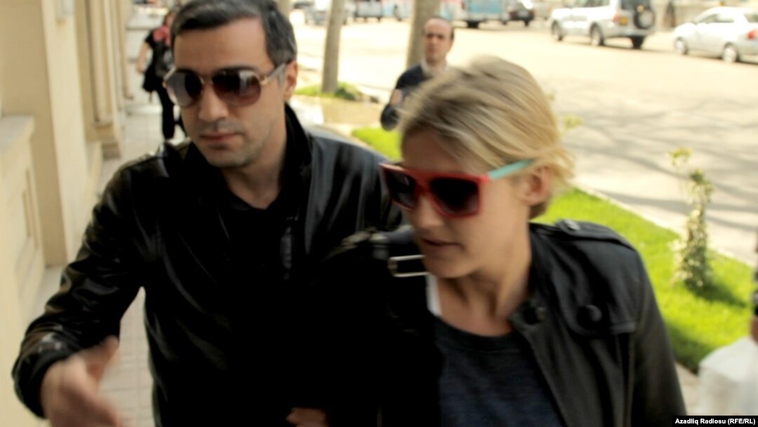Detained Swedish journalist Charlotta Wijkström (R), who was deported from Azerbaijan with two colleagues on April 18. 