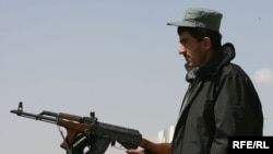 An Afghan National Police officer stands guard in Kabul.