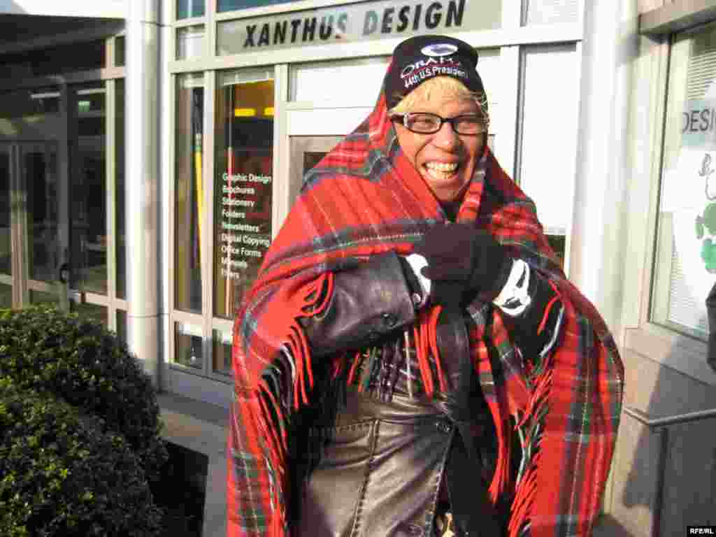 Spectators, like Yvonne Jones from Lexington, Kentucky, struggled to keep warm in freezing weather. - obama20 photo by Ricki Green