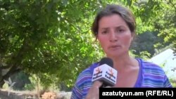 Azerbaijan - A screenshot of an interview with Farida Tagiyeva, a resident of Agbulaq village, conducted by RFE/RL's Azerbaijani service, 9Aug2014. 