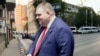 Колаж със снимки на полицейски бусове около централата на "ДПС – Ново начало". На преден план е лидерът на формацията Делян Пеевски