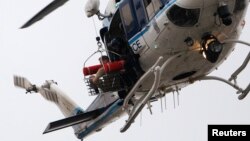 Կոլումբիայի ոստիկանության ուղղաթիռը հատուկ գործողության ժամանակ, արխիվ