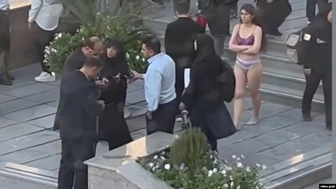 Iranian authorities arrested the female student after she stripped to her underwear on the street outside the university. 