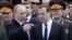 Russian President Vladimir Putin (left) to former Prime Minister Dmitry Medvedev: "I'm tired, you're going." 