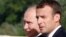 Russian President Vladimir Putin (left) and French President Emmanuel Macron speak during a meeting in St. Petersburg on May 24.