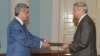 Armenia - Vyacheslav Kovalenko, the newly appointed Ambassador of Russia to Armenia, hands his credentials to President Serzh Sarkisian (L) 4Sep2009.