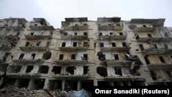 Разрушенное здание в Алеппо. 3 декабря 2016 года.