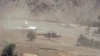 FILE: An Afghan national army helicopter lands in a remote part of Afghanistan.