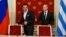 Greek Prime Minister Alexis Tsipras (left) and Russian President Vladimir Putin in the Kremlin in Moscow on April 8