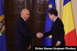 Премиерът Илие Боложан и президентът Никушор Дан, 23 юни.