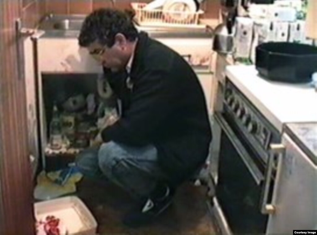 Mehrdad Farrokhzad in the kitchen of the Bonn apartment where his brother Fereydoun was brutally stabbed to death just weeks before.